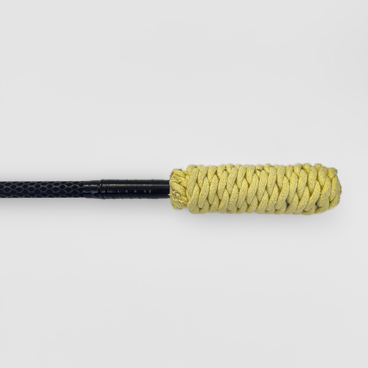 closeup of a knotted kevlar wick on a fire mace