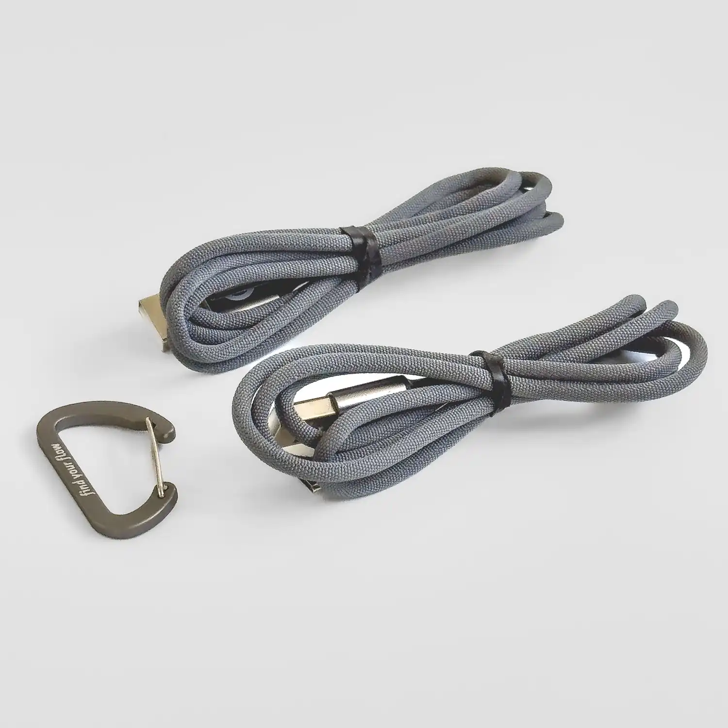 full shot showing podpoi charging cables and carabiner