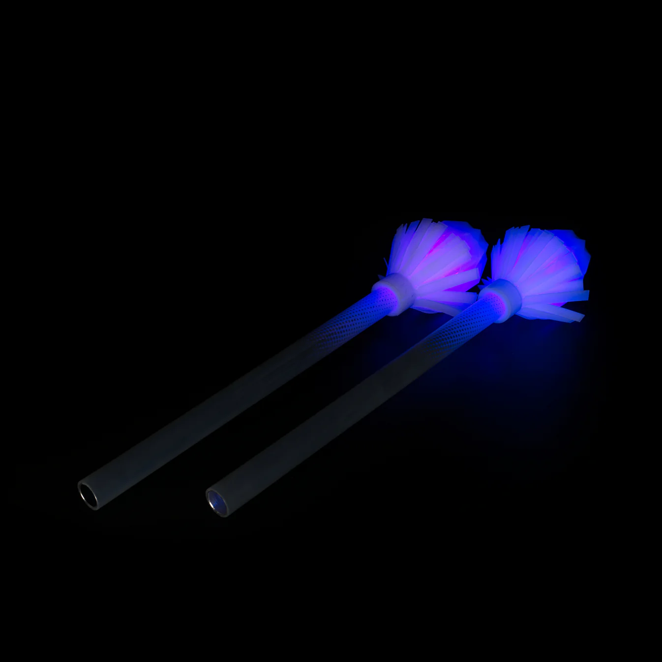 layflat of led prism end pieces for contact staff lit up in a dark room