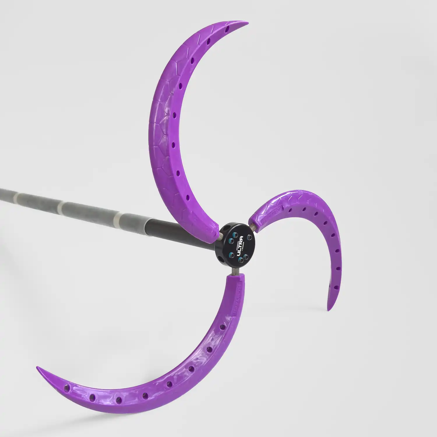closeup of assembled spiral dragon claw practice dragon staff with purple claws