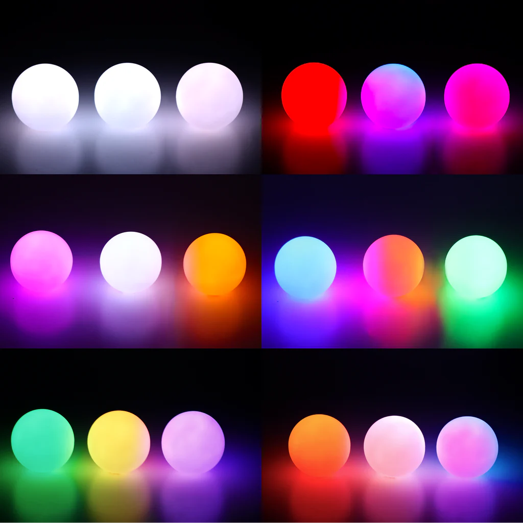 side by side comparison photo showing all colors of the led juggle balls