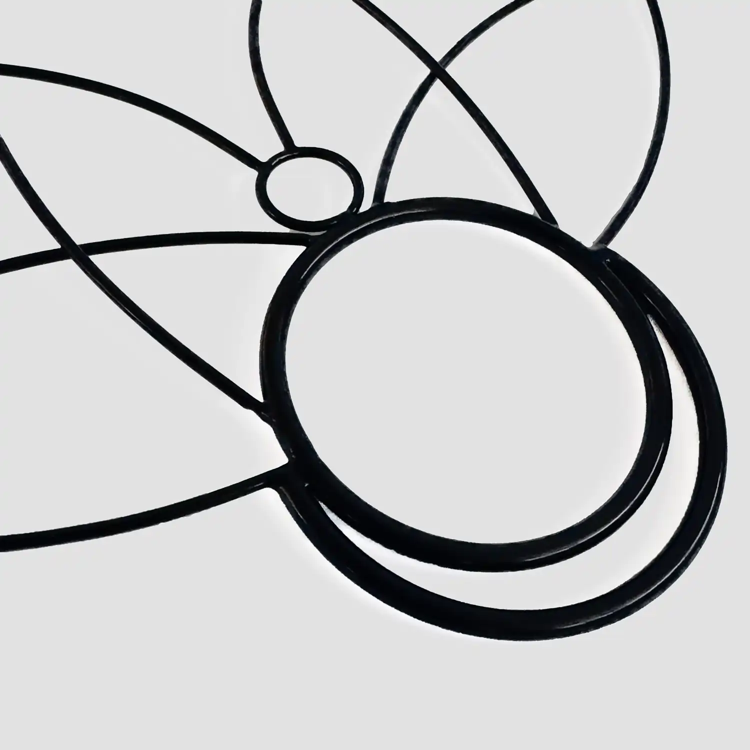 closeup of the russian grip handle on a set of fire fans showing larger ring