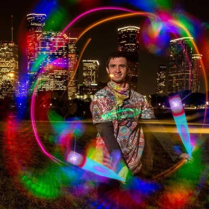 vortex poi night time close up action shot with light trails