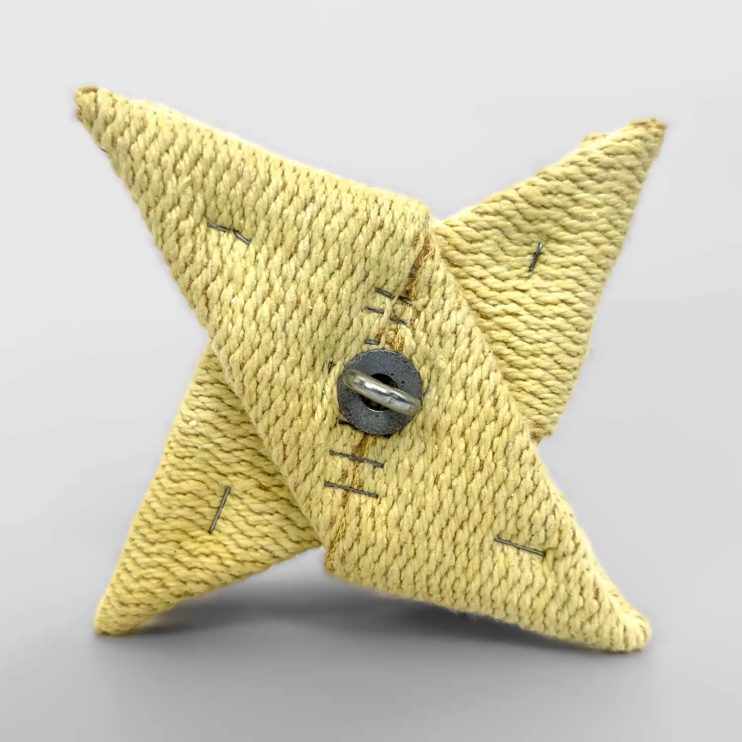 Full shot of a single shuriken lotus death star shaped fire kevlar head