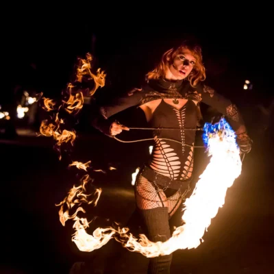 action shot of flow mayhem posing with shuriken fire rope dart