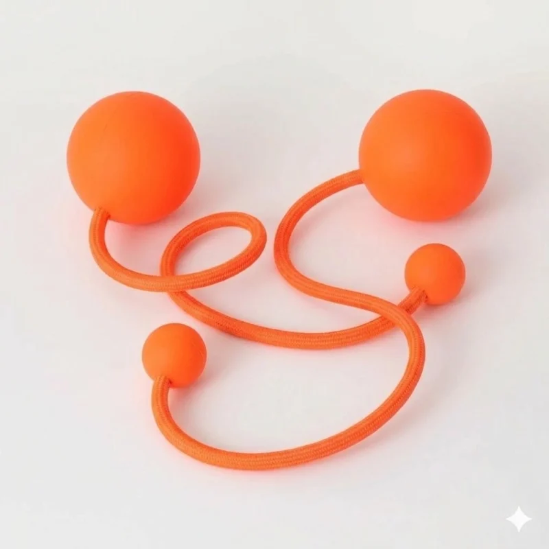 Full shot of a pair of orange contact poi with large silicone knobs
