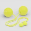 Full shot of a pair of yellow contact poi with large silicone knobs