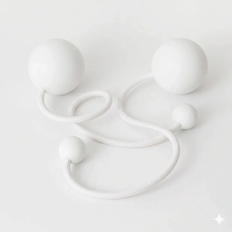 Full shot of a pair of white contact poi with large silicone knobs